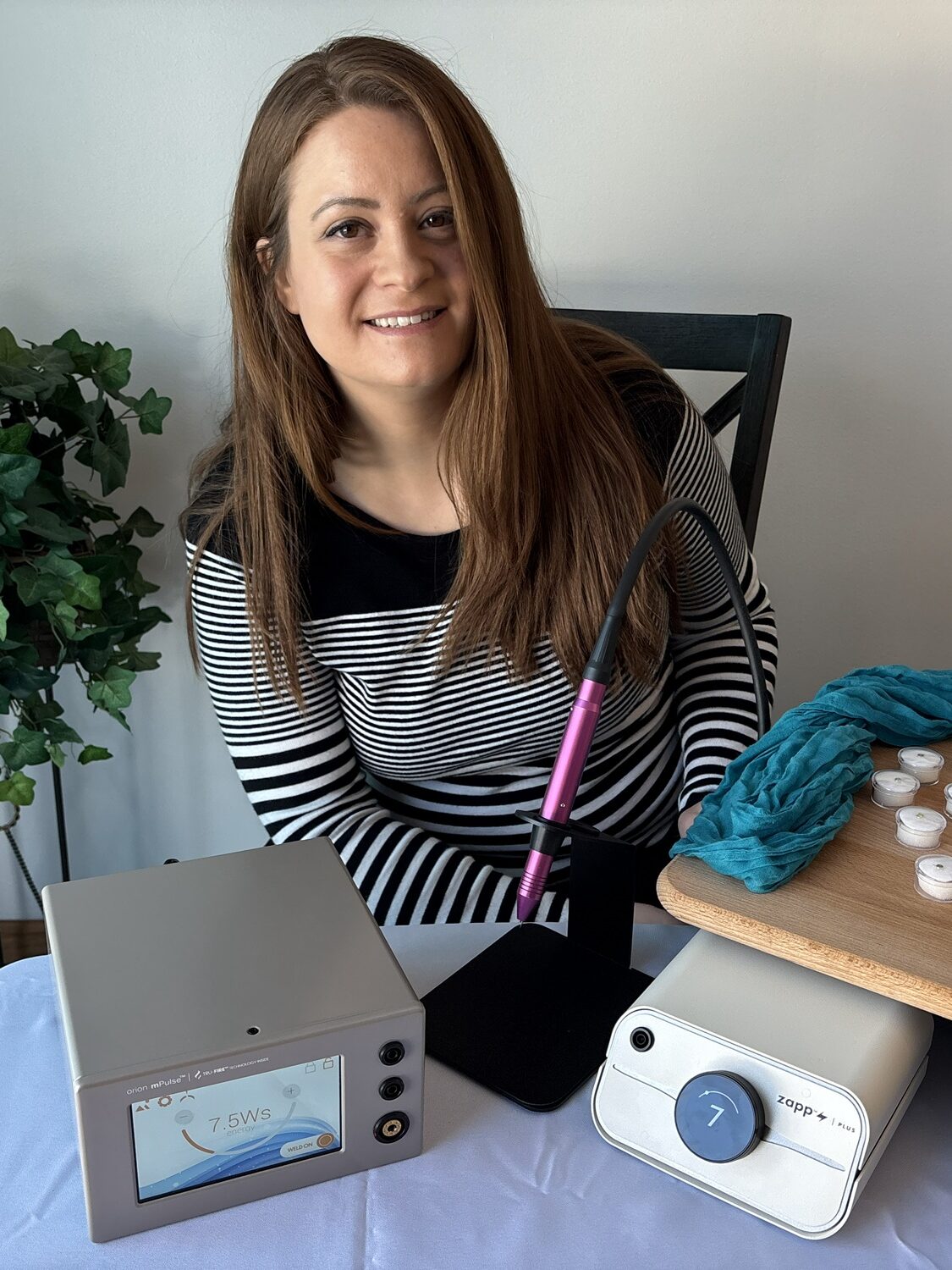 Trinity smiling with Sunstone welding machines